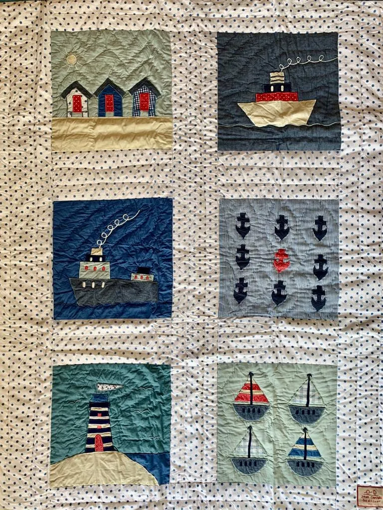 Ship -Blue spot cot quilt.